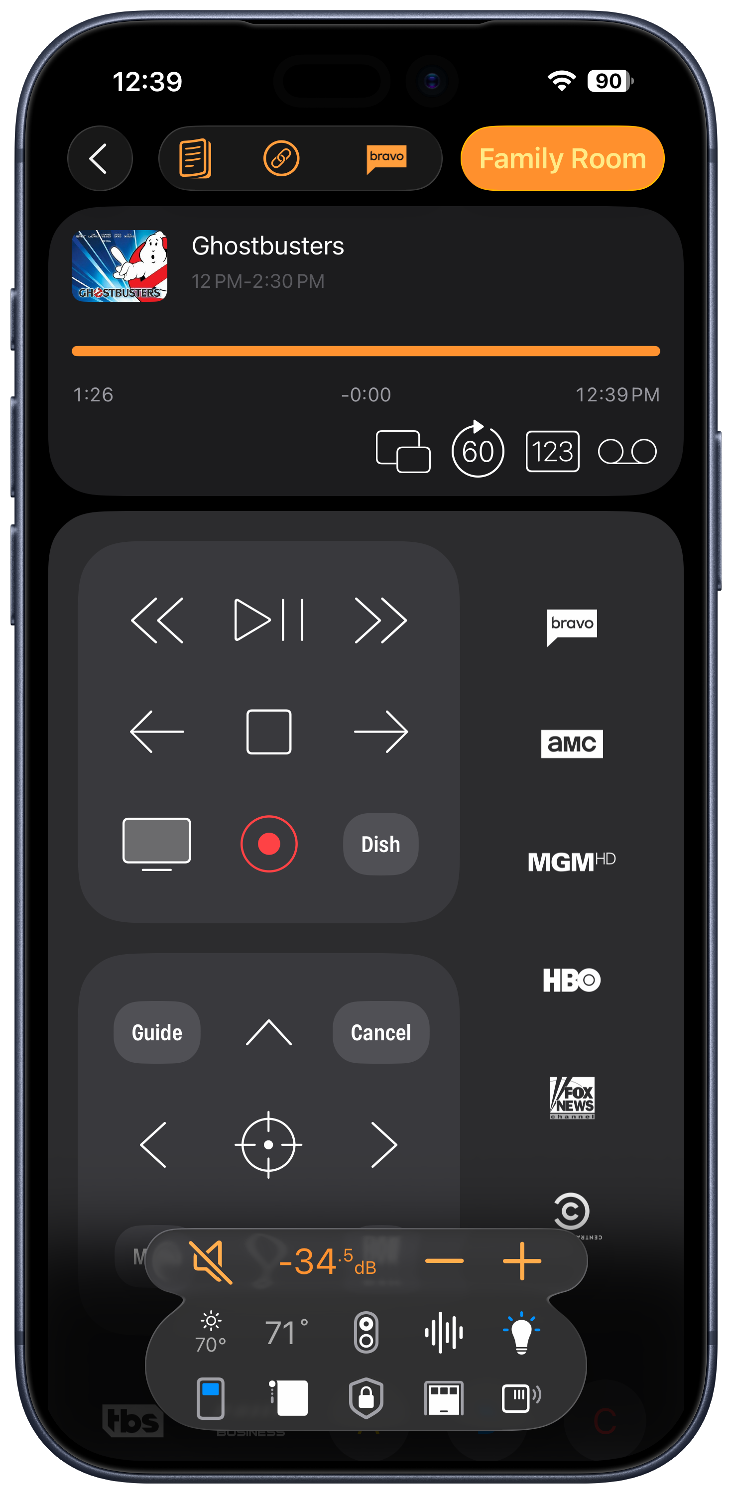 Roomie Remote X app on iPhone showing home theater controls